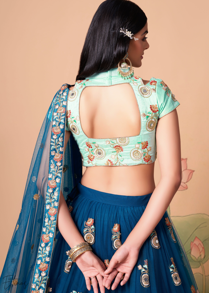 Teal Blue Opulent Floral Mirror Net Lehenga