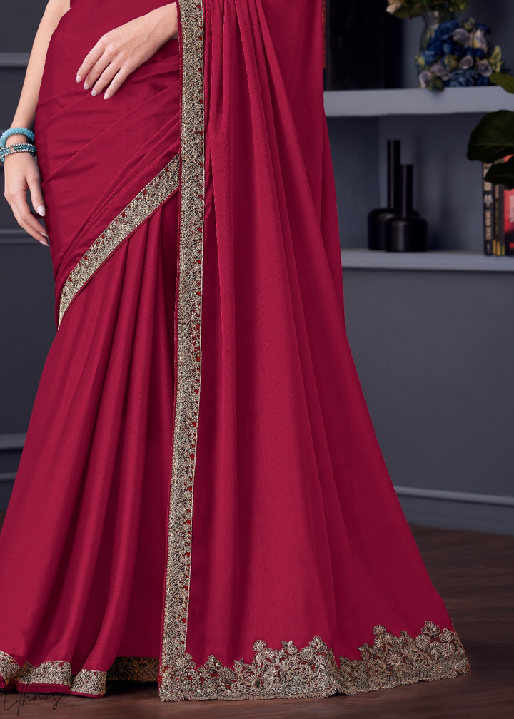 Fuchsia Pink Heavy Border Embroidered Georgette Saree