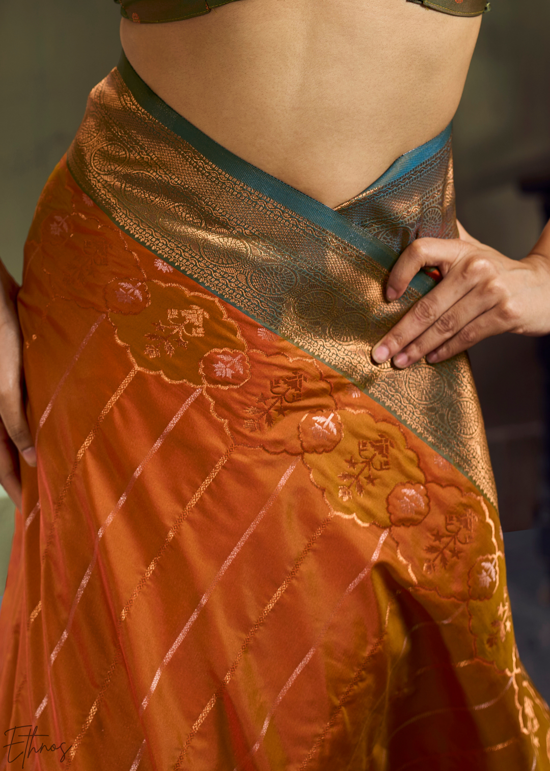 Gilded Saffron Moss Pochampally Ikkat Silk Saree