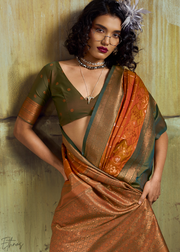 Gilded Saffron Moss Pochampally Ikkat Silk Saree
