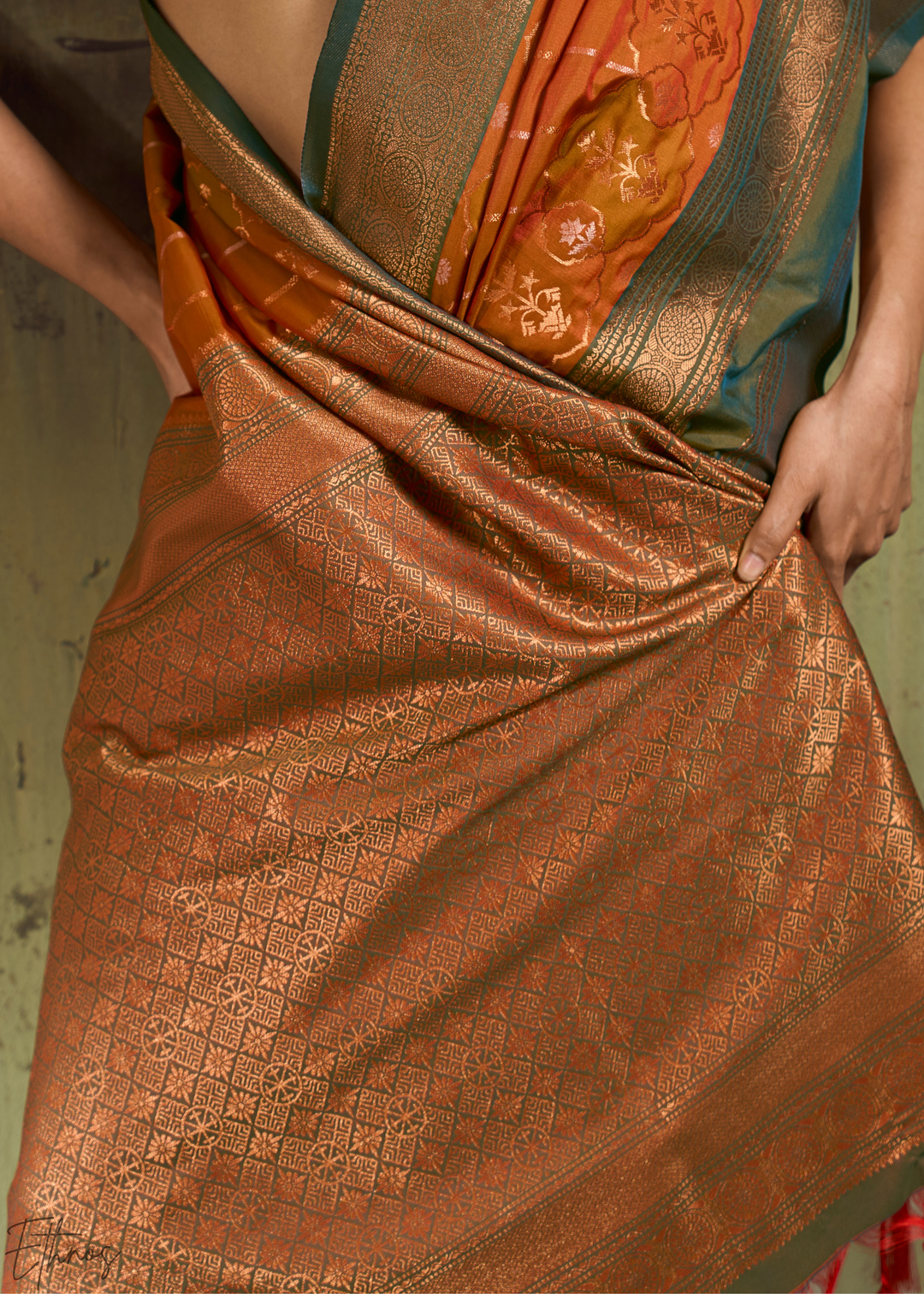 Gilded Saffron Moss Pochampally Ikkat Silk Saree