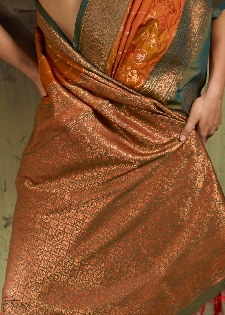 Gilded Saffron Moss Pochampally Ikkat Silk Saree