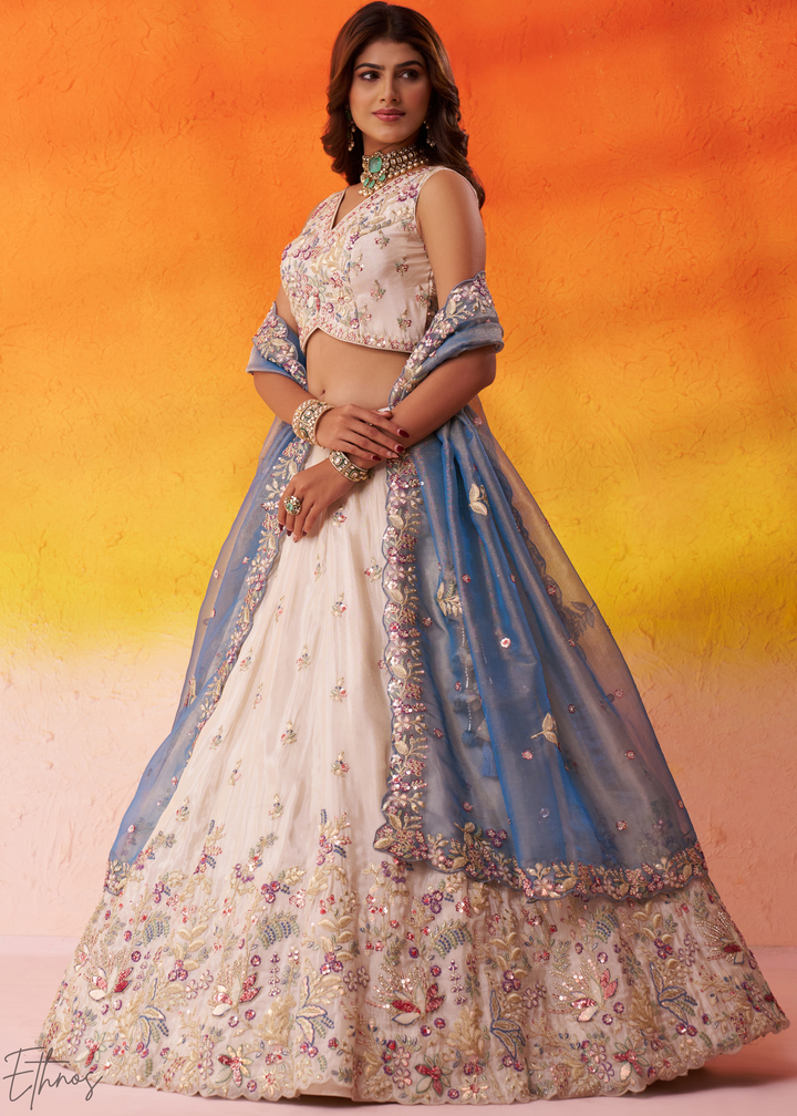 Ivory White and Blue Peacock Embroidered Tissue Lehenga