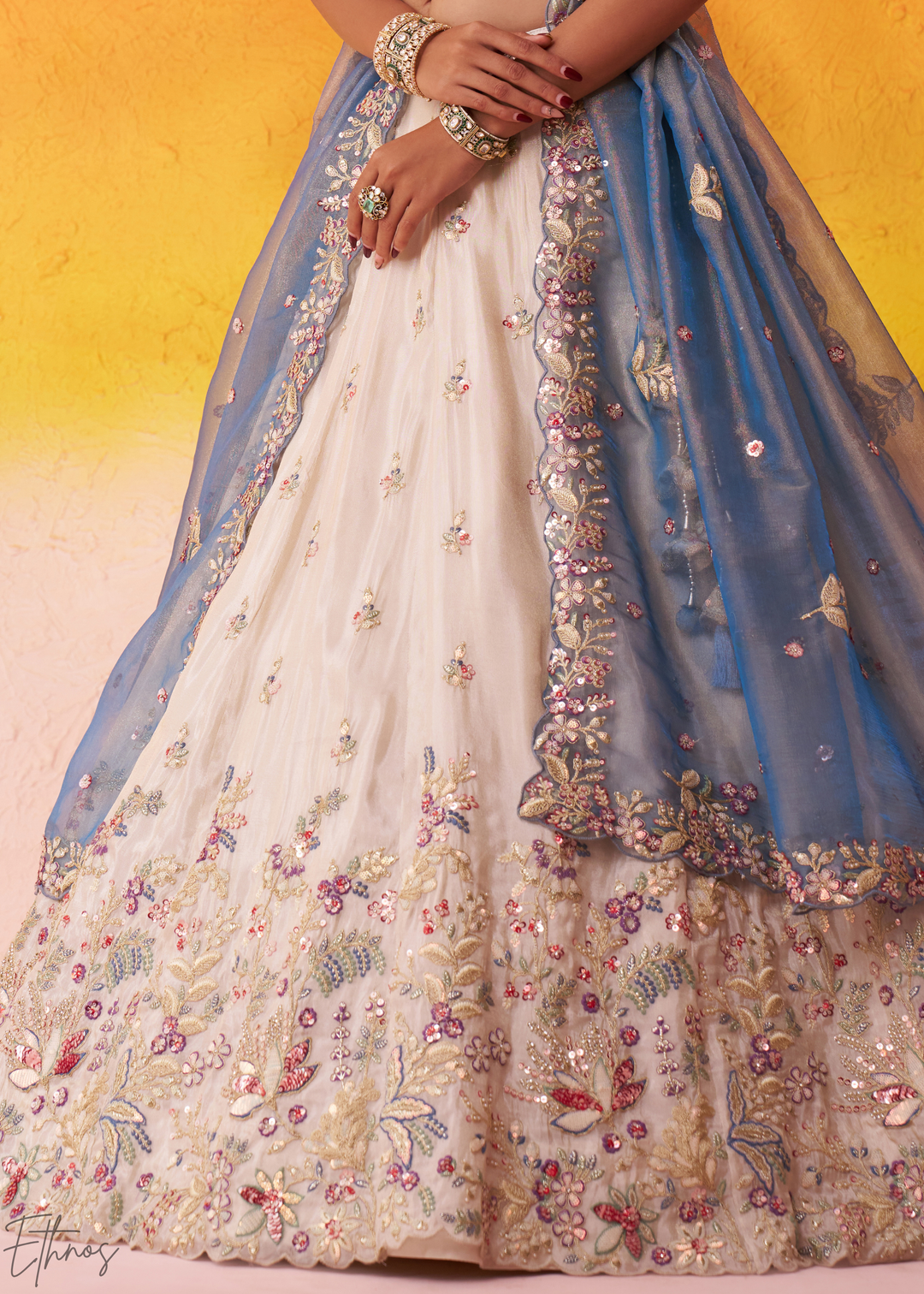 Ivory White and Blue Peacock Embroidered Tissue Lehenga