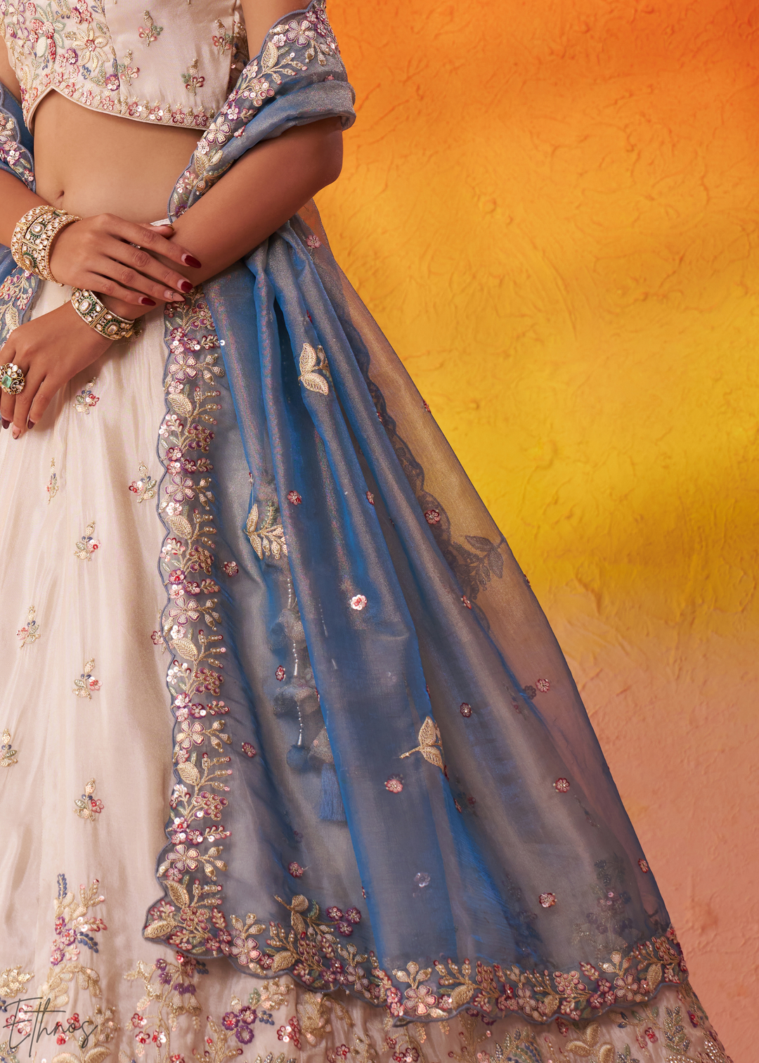 Ivory White and Blue Peacock Embroidered Tissue Lehenga