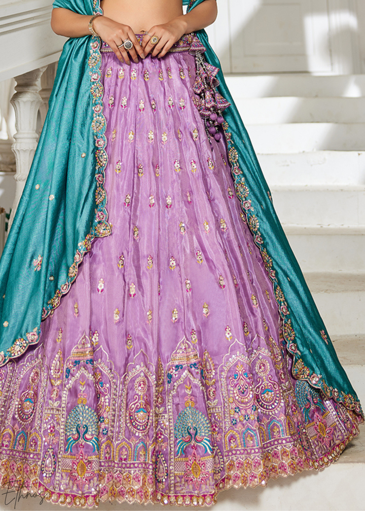 Lavender and Sky Blue Peacock Embroidered Tissue Lehenga Choli