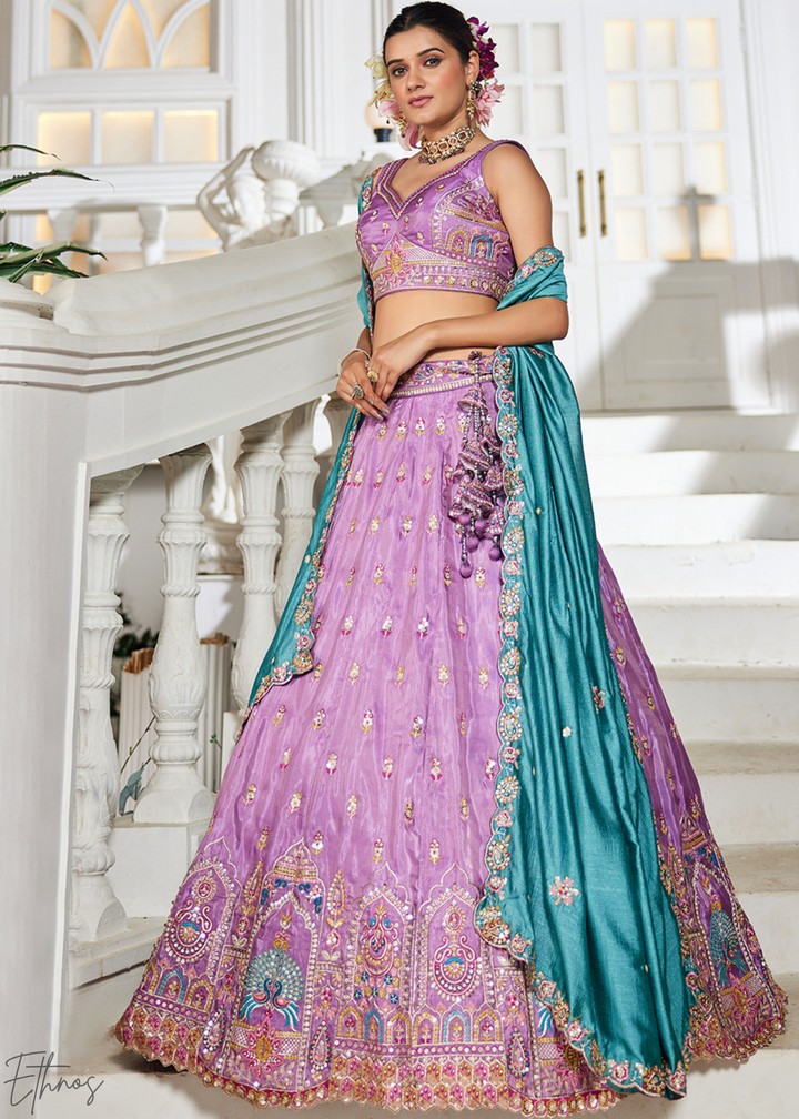 Lavender and Sky Blue Peacock Embroidered Tissue Lehenga Choli