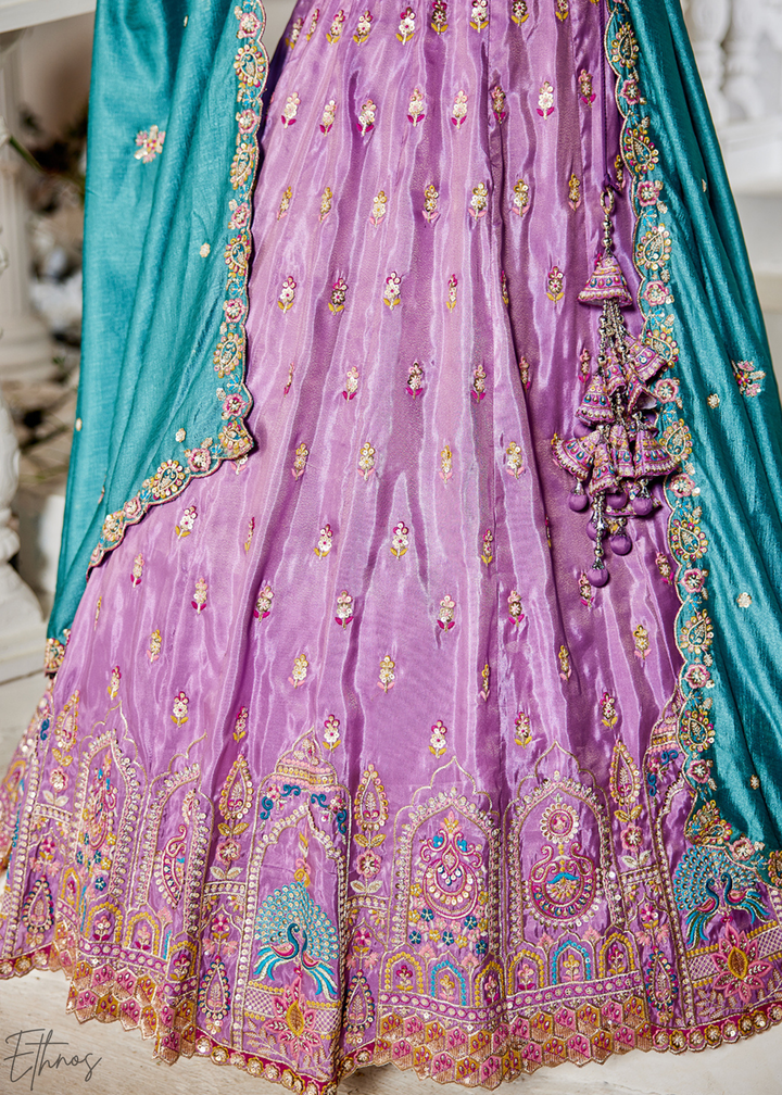 Lavender and Sky Blue Peacock Embroidered Tissue Lehenga Choli
