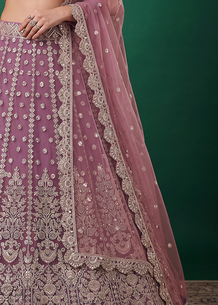 Mauve Purple Heavy Floral Embroidered Net Lehenga