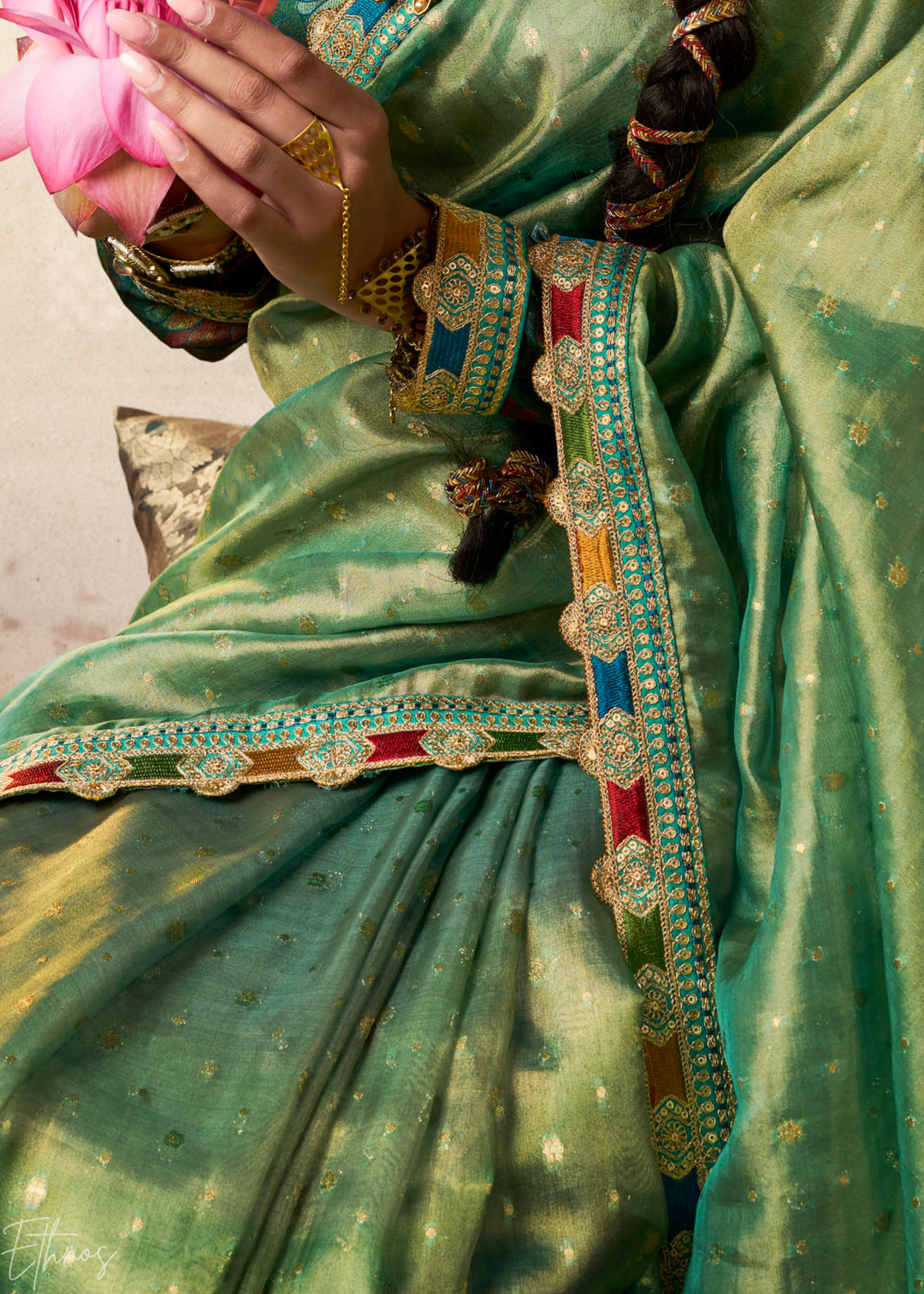 Mint Green Pom-Pom Border Tissue Silk Saree