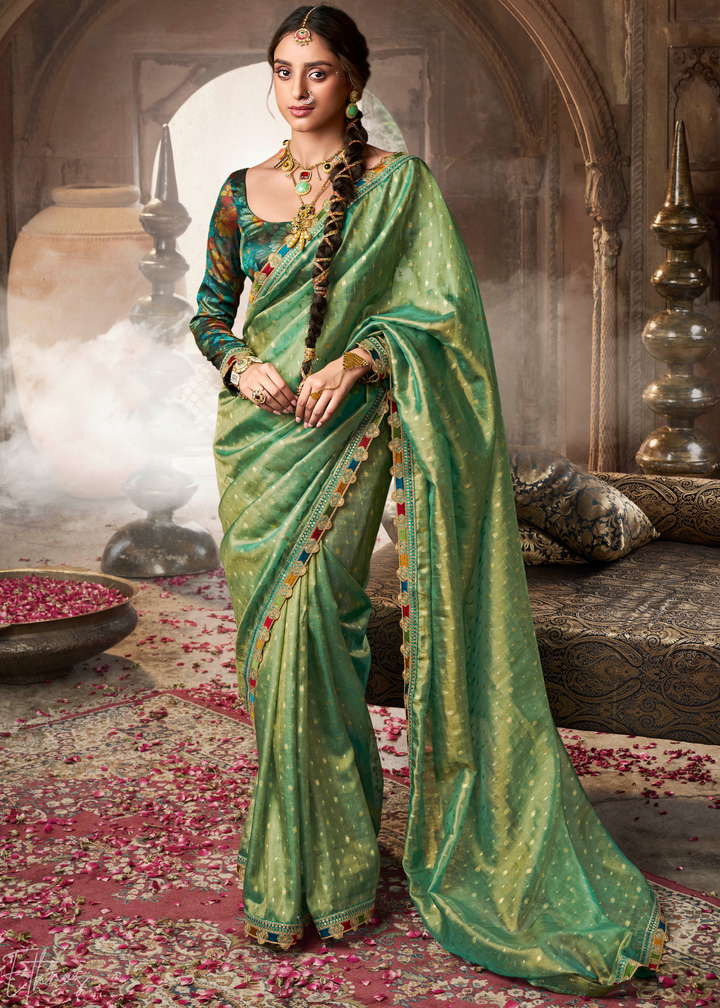 Mint Green Pom-Pom Border Tissue Silk Saree