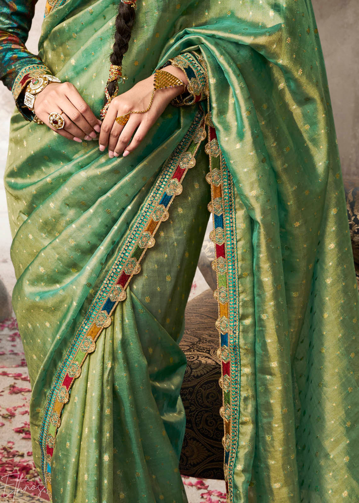 Mint Green Pom-Pom Border Tissue Silk Saree