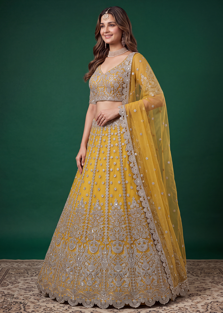 Mustard Yellow Heavy Floral Embroidered Net Lehenga