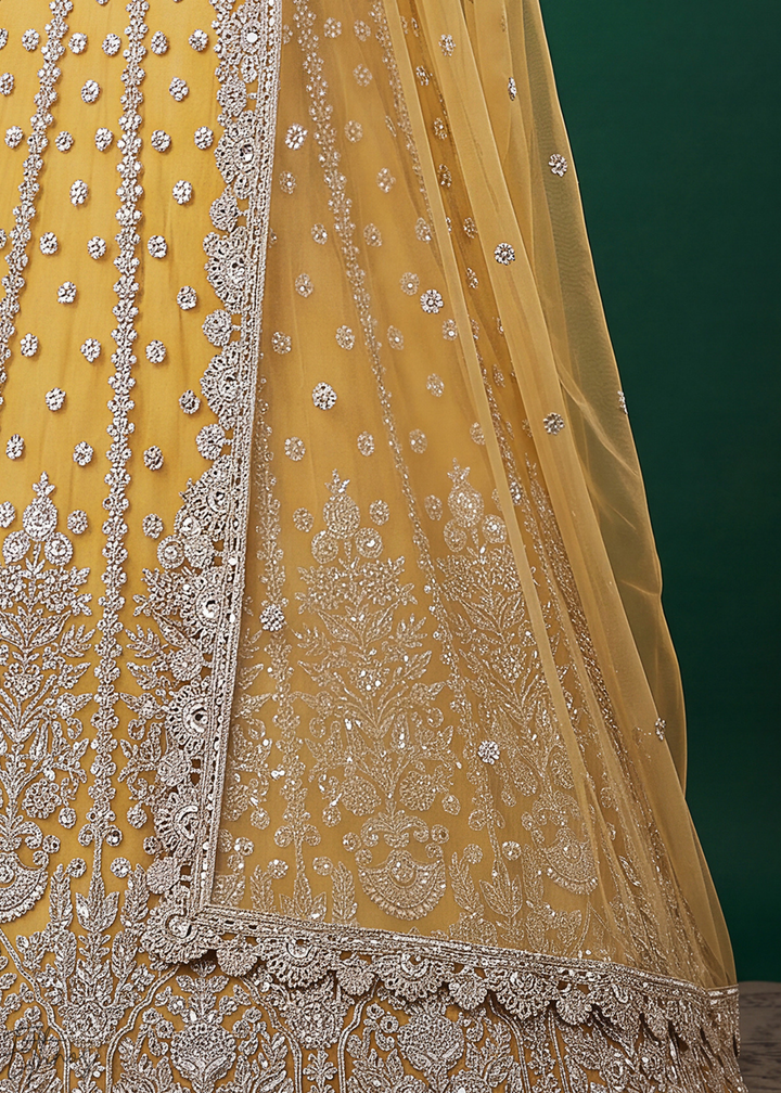 Mustard Yellow Heavy Floral Embroidered Net Lehenga