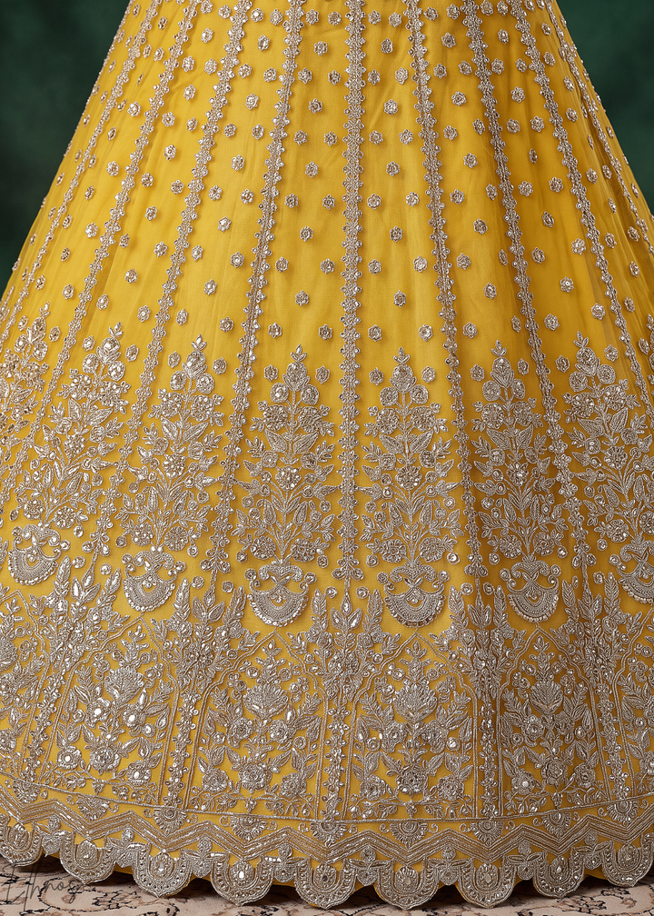 Mustard Yellow Heavy Floral Embroidered Net Lehenga
