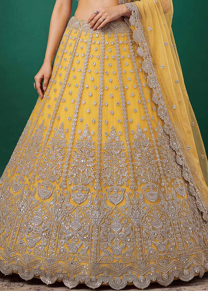 Mustard Yellow Heavy Floral Embroidered Net Lehenga