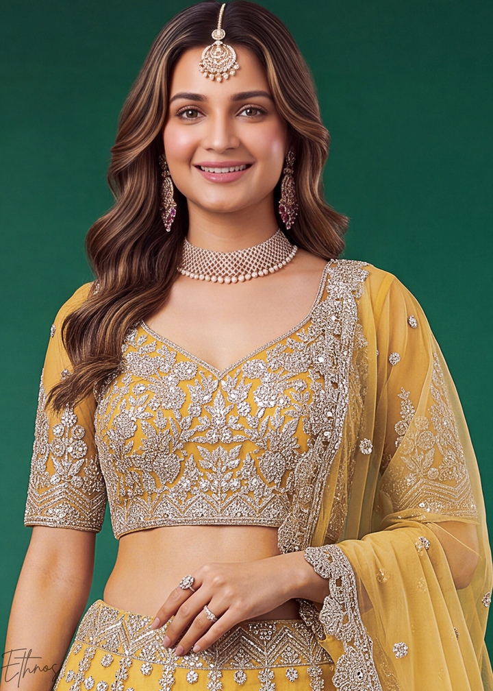 Mustard Yellow Heavy Floral Embroidered Net Lehenga