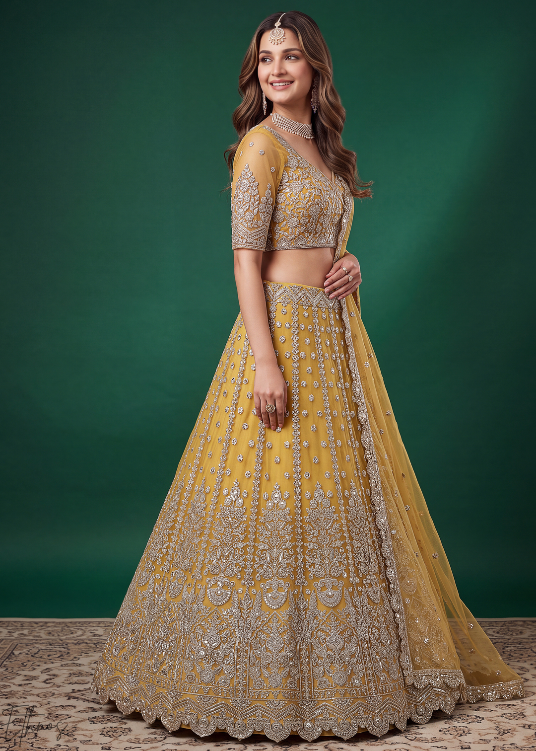 Mustard Yellow Heavy Floral Embroidered Net Lehenga