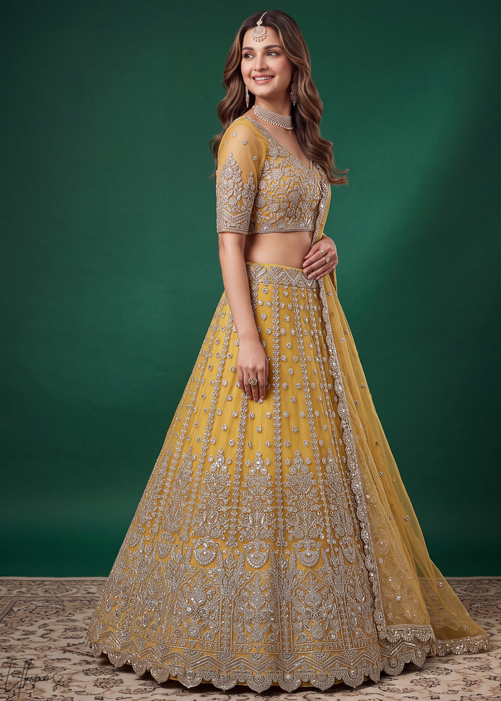Mustard Yellow Heavy Floral Embroidered Net Lehenga