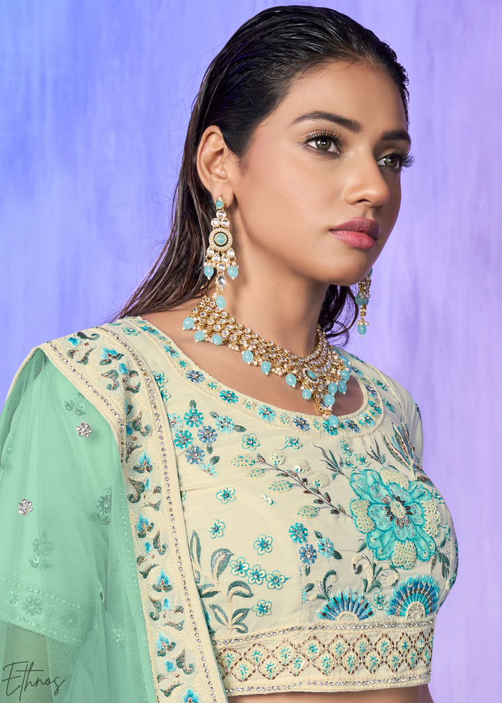 Off-White & Aqua Floral Embroidered Velvet Lehenga Choli Set