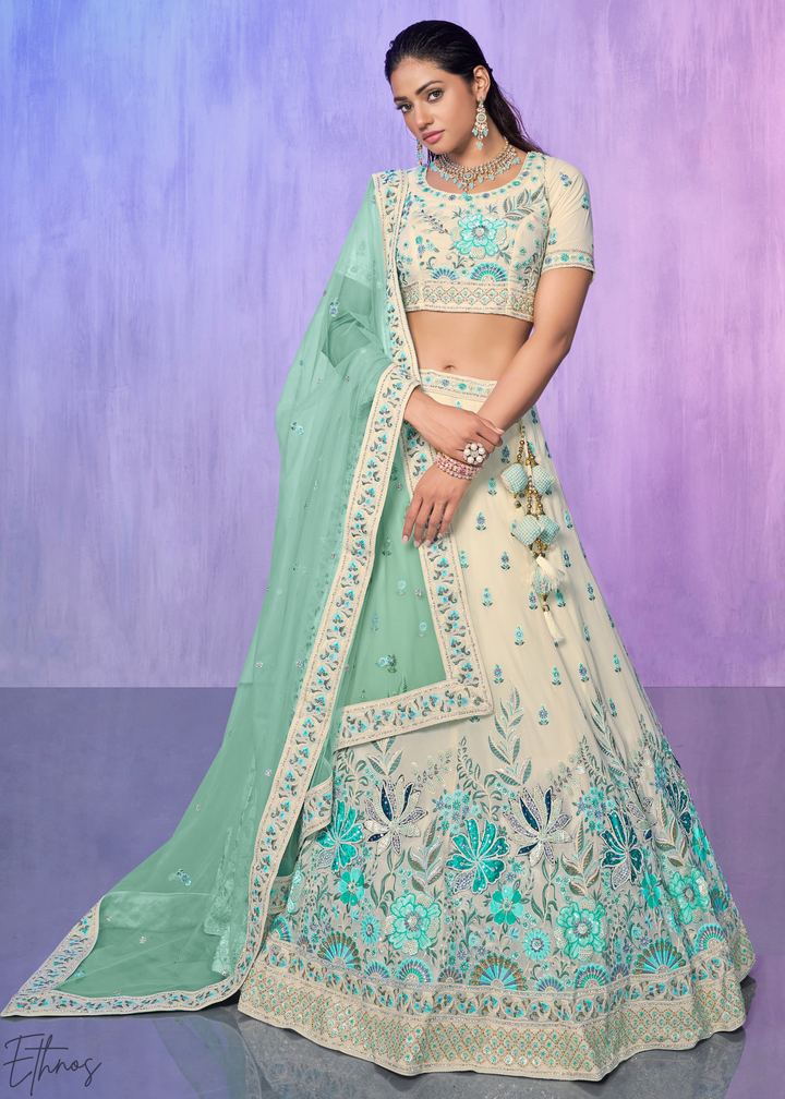 Off-White & Aqua Floral Embroidered Velvet Lehenga Choli Set