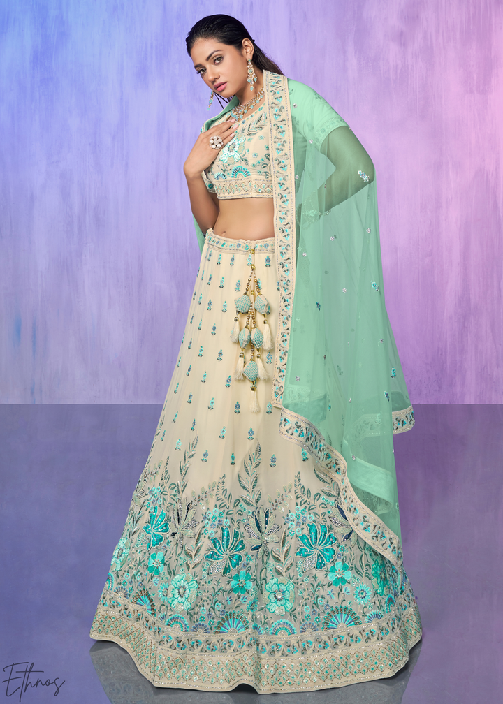 Off-White & Aqua Floral Embroidered Velvet Lehenga Choli Set