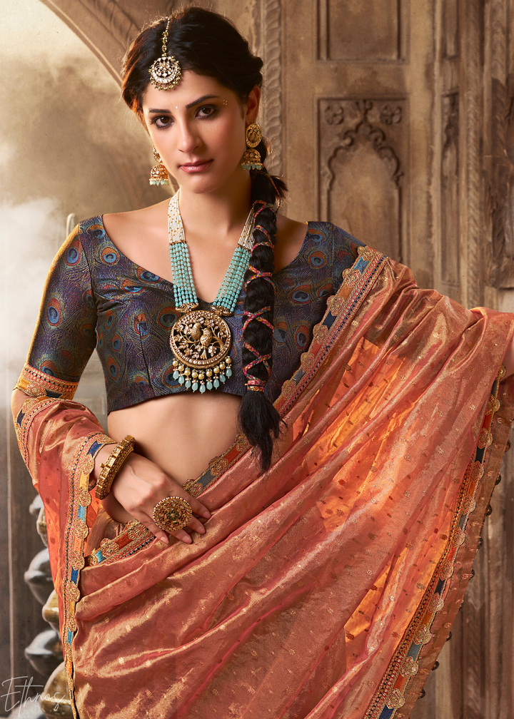 Pastel Coral Pom-Pom Border Tissue Silk Saree