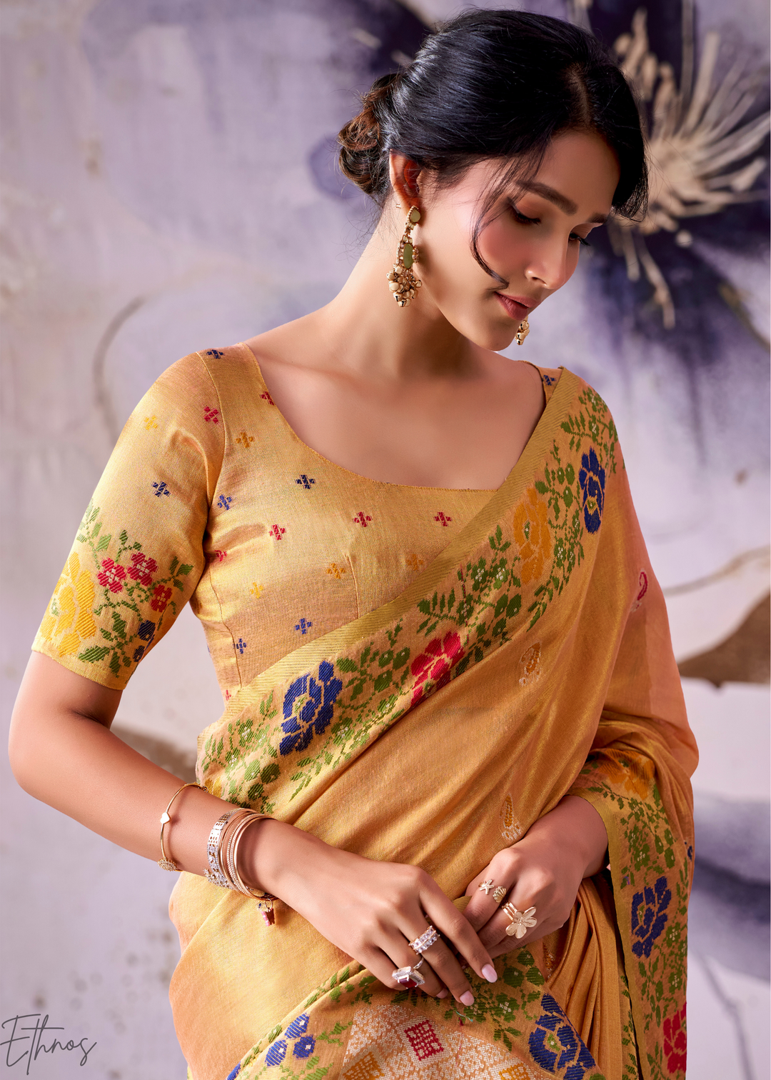 Pastel Orange Floral-Patola Pallu Tissue Silk Saree