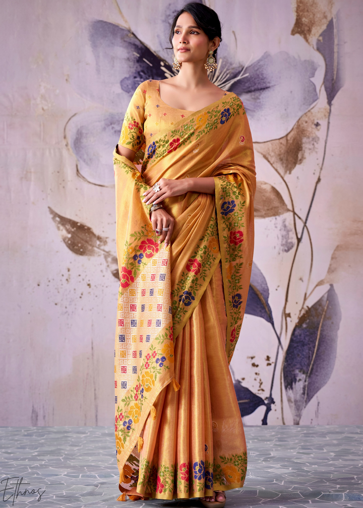 Pastel Orange Floral-Patola Pallu Tissue Silk Saree