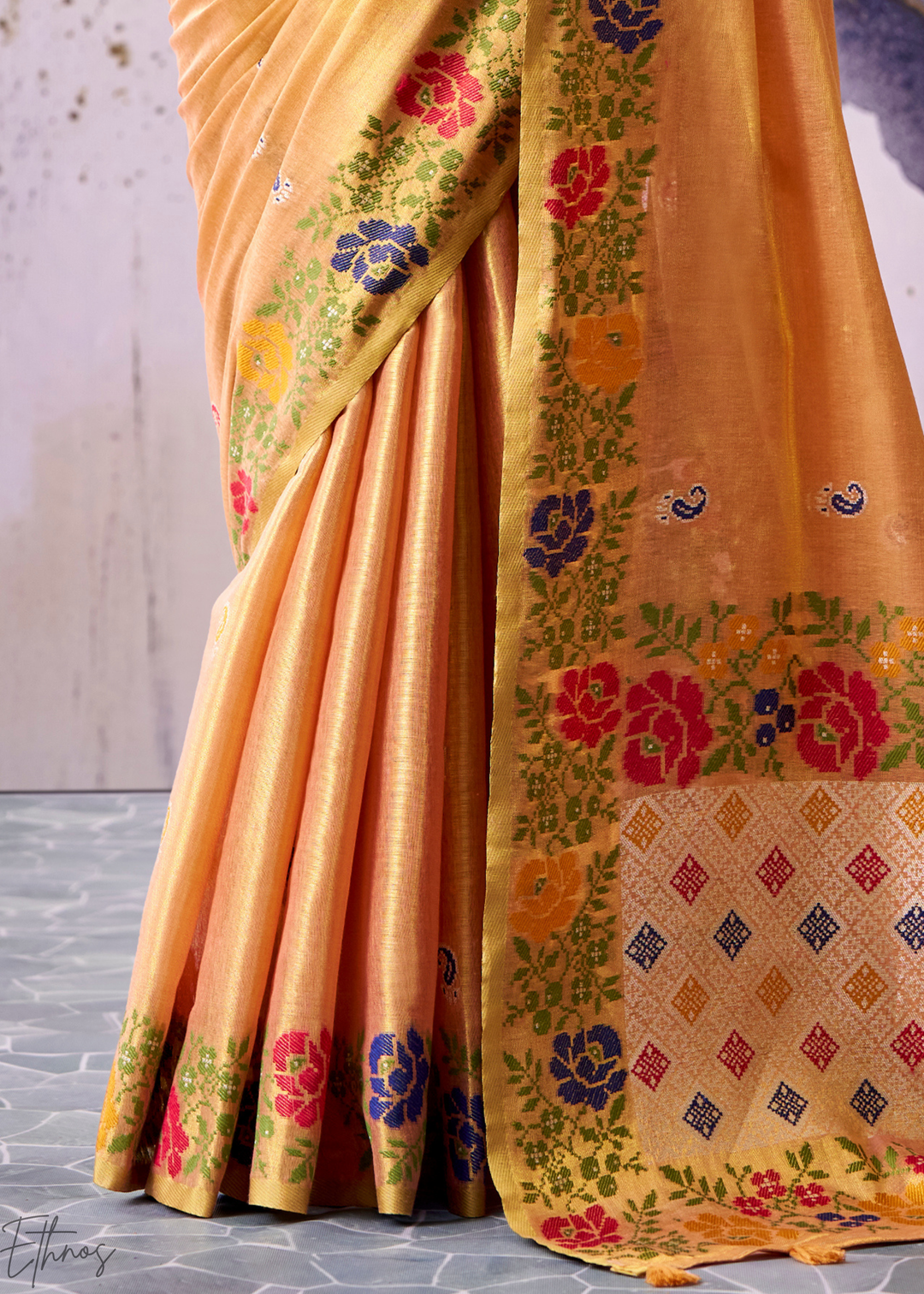 Pastel Orange Floral-Patola Pallu Tissue Silk Saree