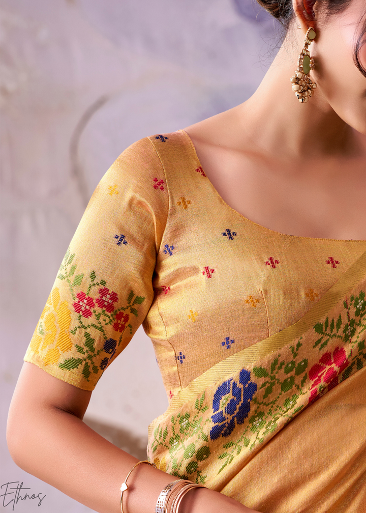 Pastel Orange Floral-Patola Pallu Tissue Silk Saree