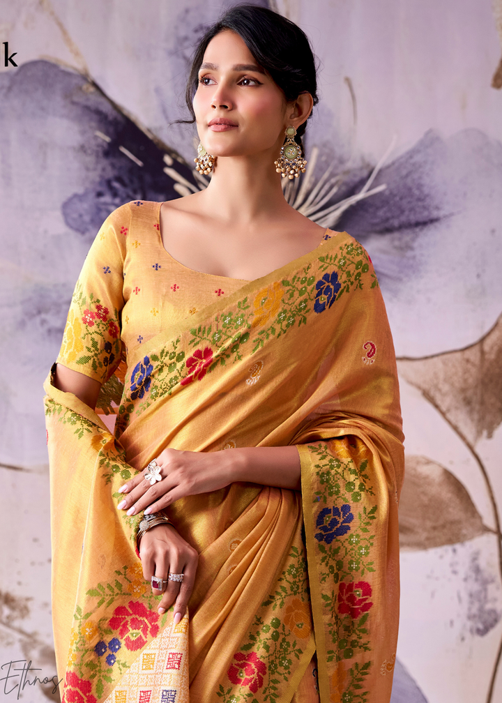 Pastel Orange Floral-Patola Pallu Tissue Silk Saree