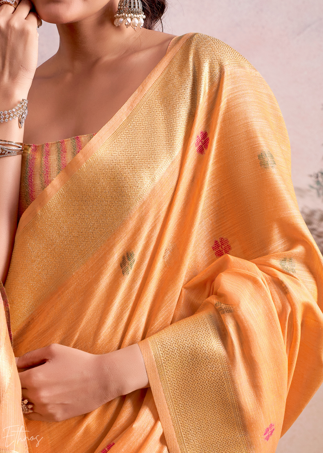 Pastel Orange Lotus Pallu Linen Silk Saree