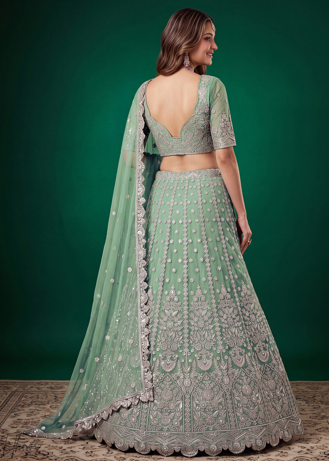 Pistachio Green Heavy Floral Embroidered Net Lehenga