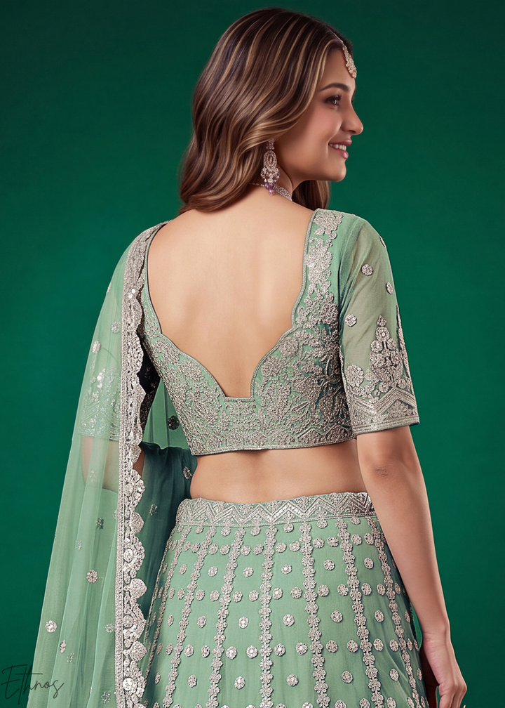 Pistachio Green Heavy Floral Embroidered Net Lehenga