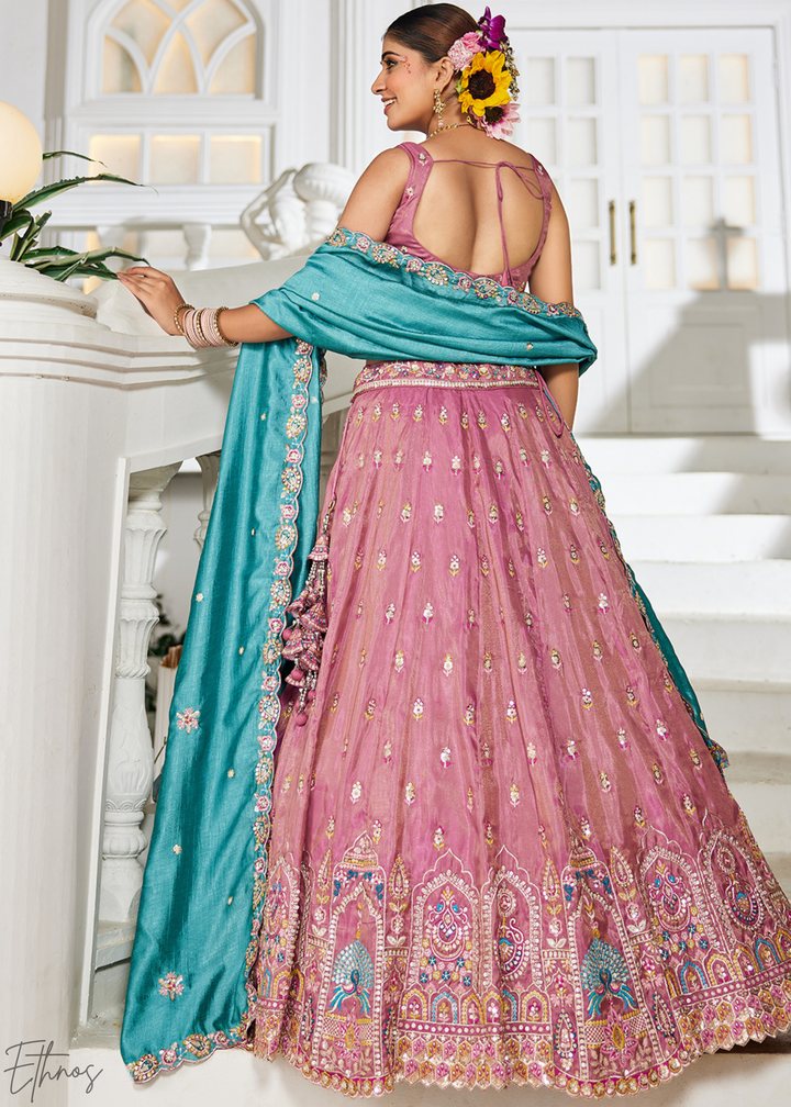 Rose Gold and Sky Blue Peacock Embroidered Tissue Lehenga Choli