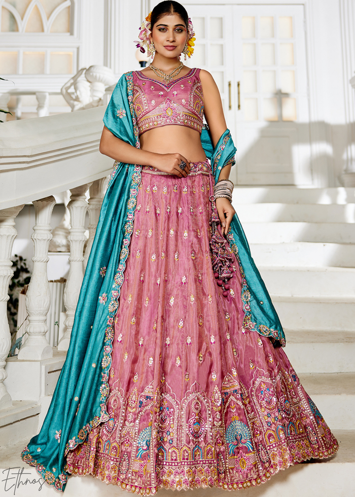 Rose Gold and Sky Blue Peacock Embroidered Tissue Lehenga Choli