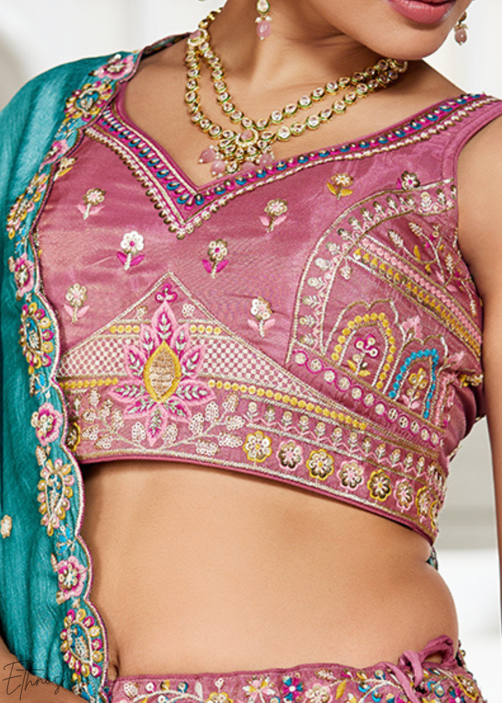 Rose Gold and Sky Blue Peacock Embroidered Tissue Lehenga Choli