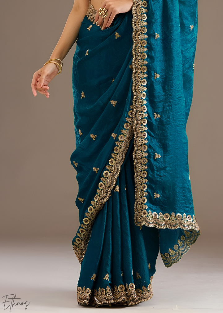 Royal Aquamarine Stellar Border Tissue Silk Saree
