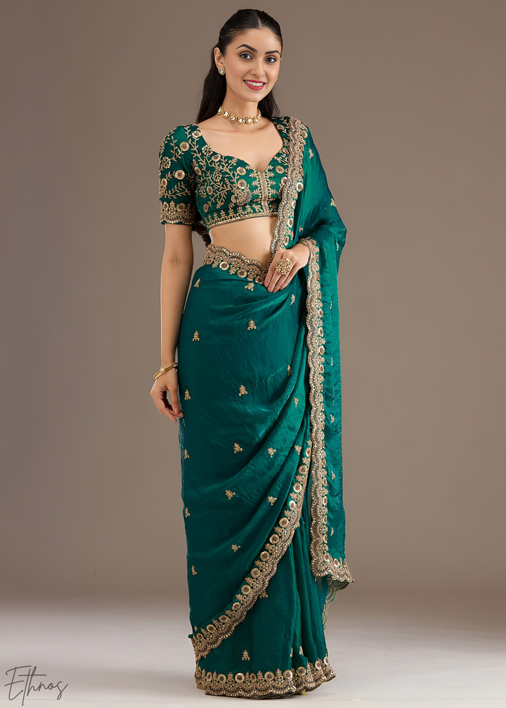 Royal Turquoise Stellar Border Tissue Silk Saree