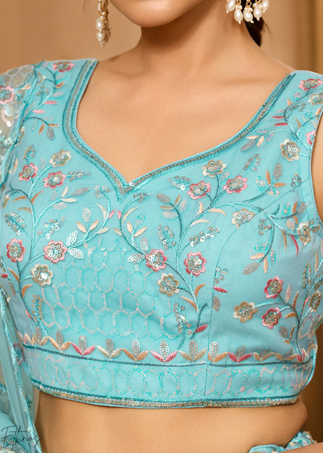 Sea Green Pastel Floral Sequins Embroidered Net Lehenga Choli