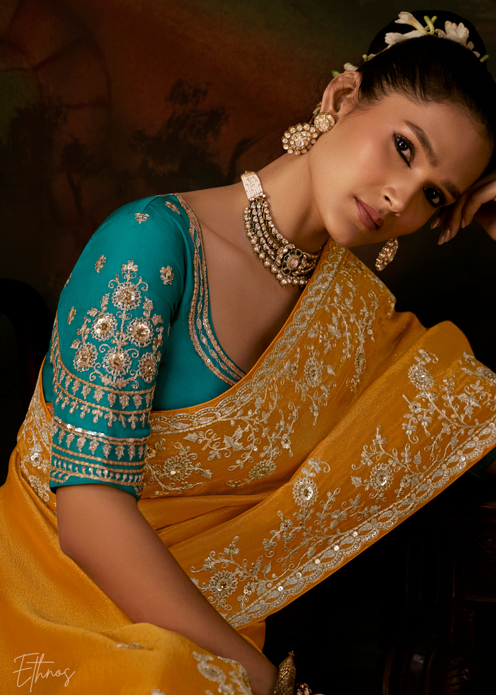 Sunset Amber Tambour Embroidered Border Tissue Saree