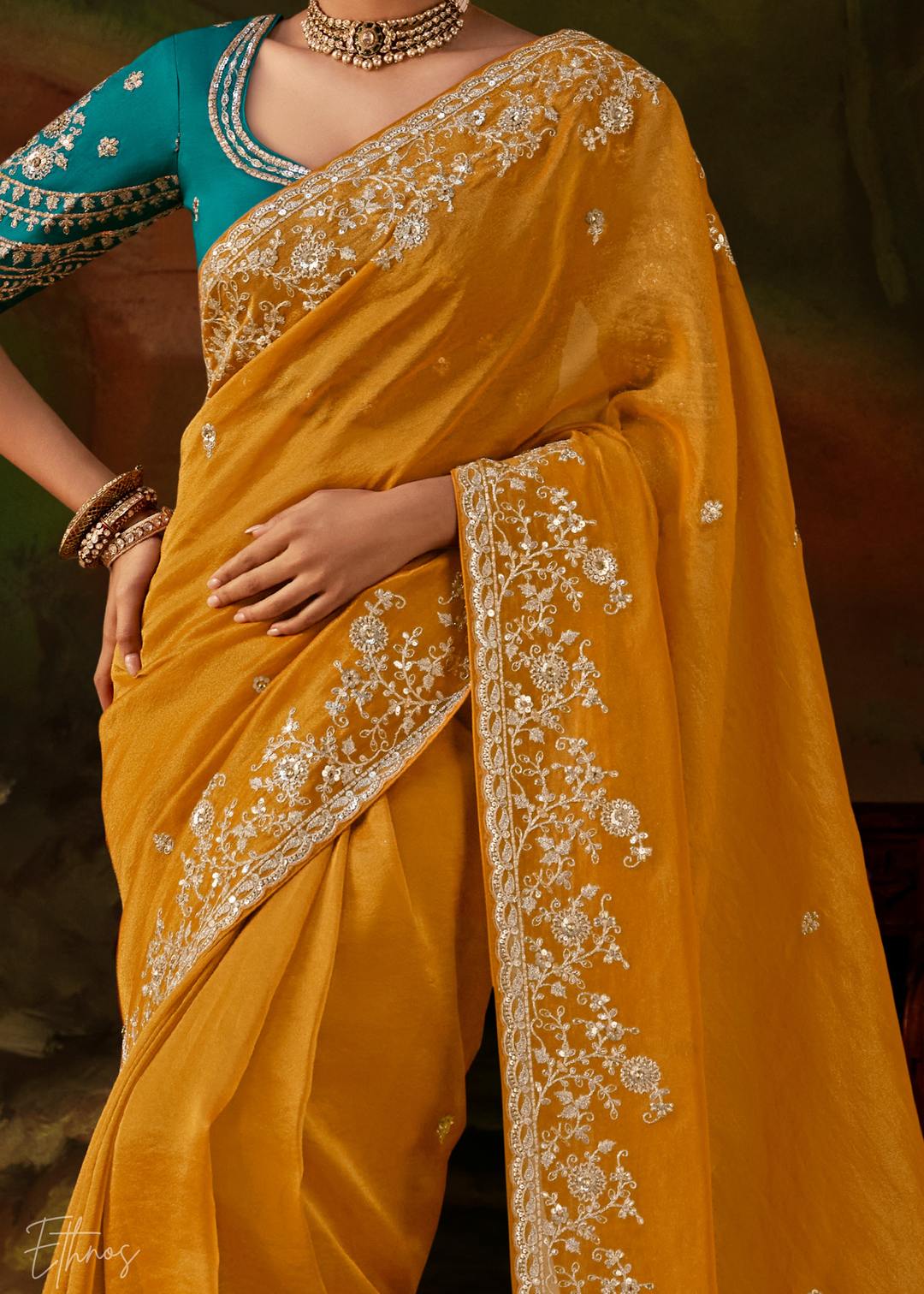 Sunset Amber Tambour Embroidered Border Tissue Saree