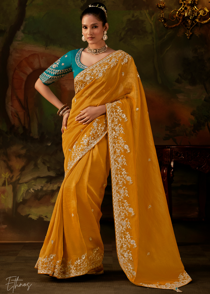 Sunset Amber Tambour Embroidered Border Tissue Saree