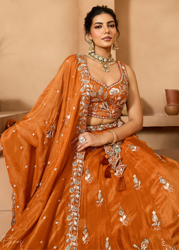 Tangerine Orange Floral Zari Embroidered Tissue Lehenga Choli