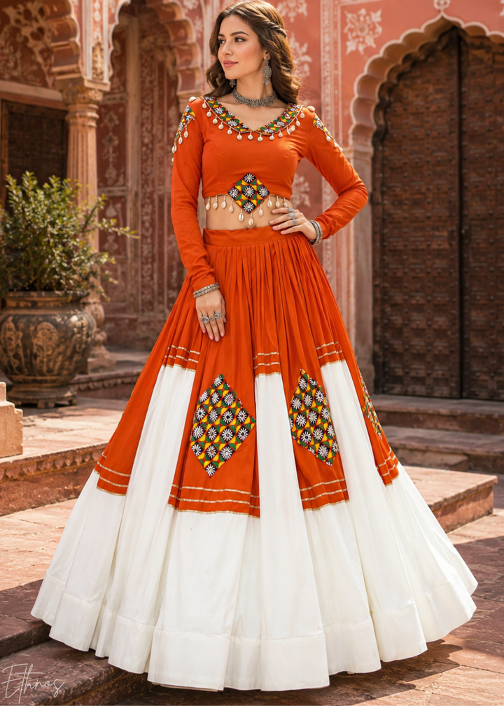 Tangerine Orange and White Patched Mirror Work Rayon Lehenga Choli