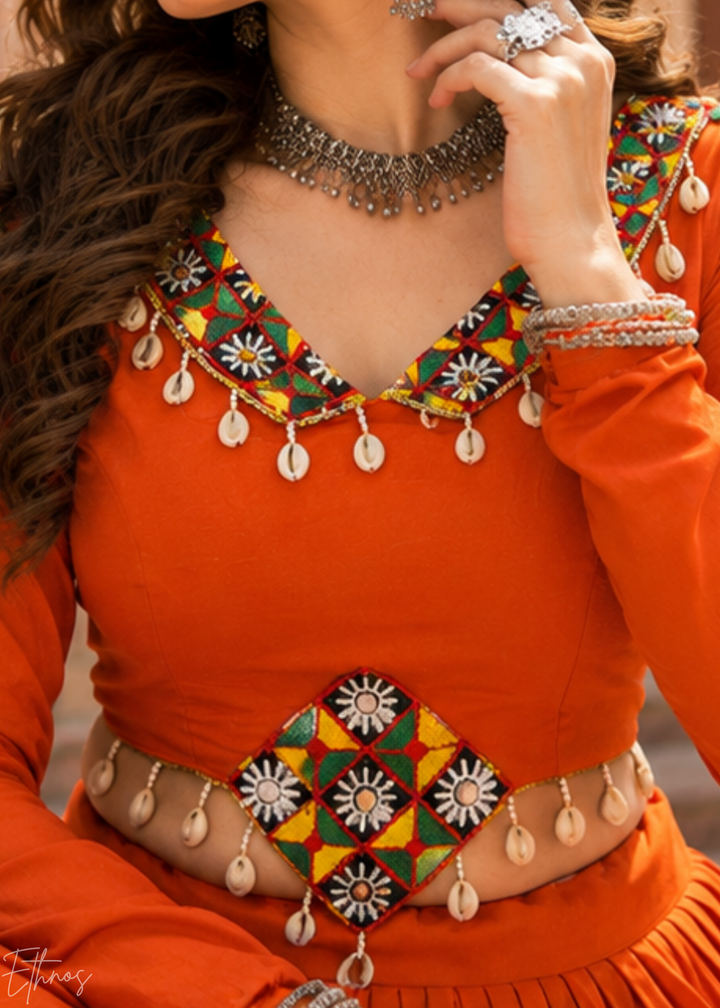 Tangerine Orange and White Patched Mirror Work Rayon Lehenga Choli
