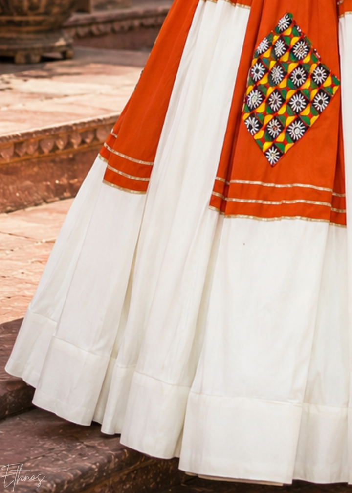 Tangerine Orange and White Patched Mirror Work Rayon Lehenga Choli