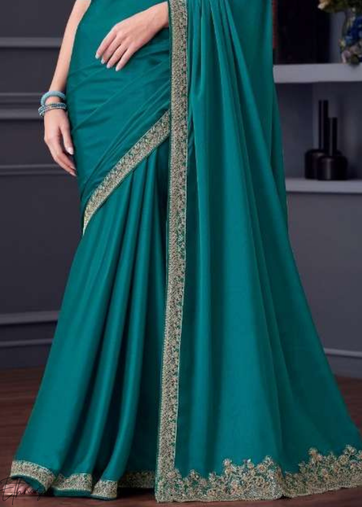 Teal Blue Heavy Border Embroidered Opium Silk Chiffon Saree