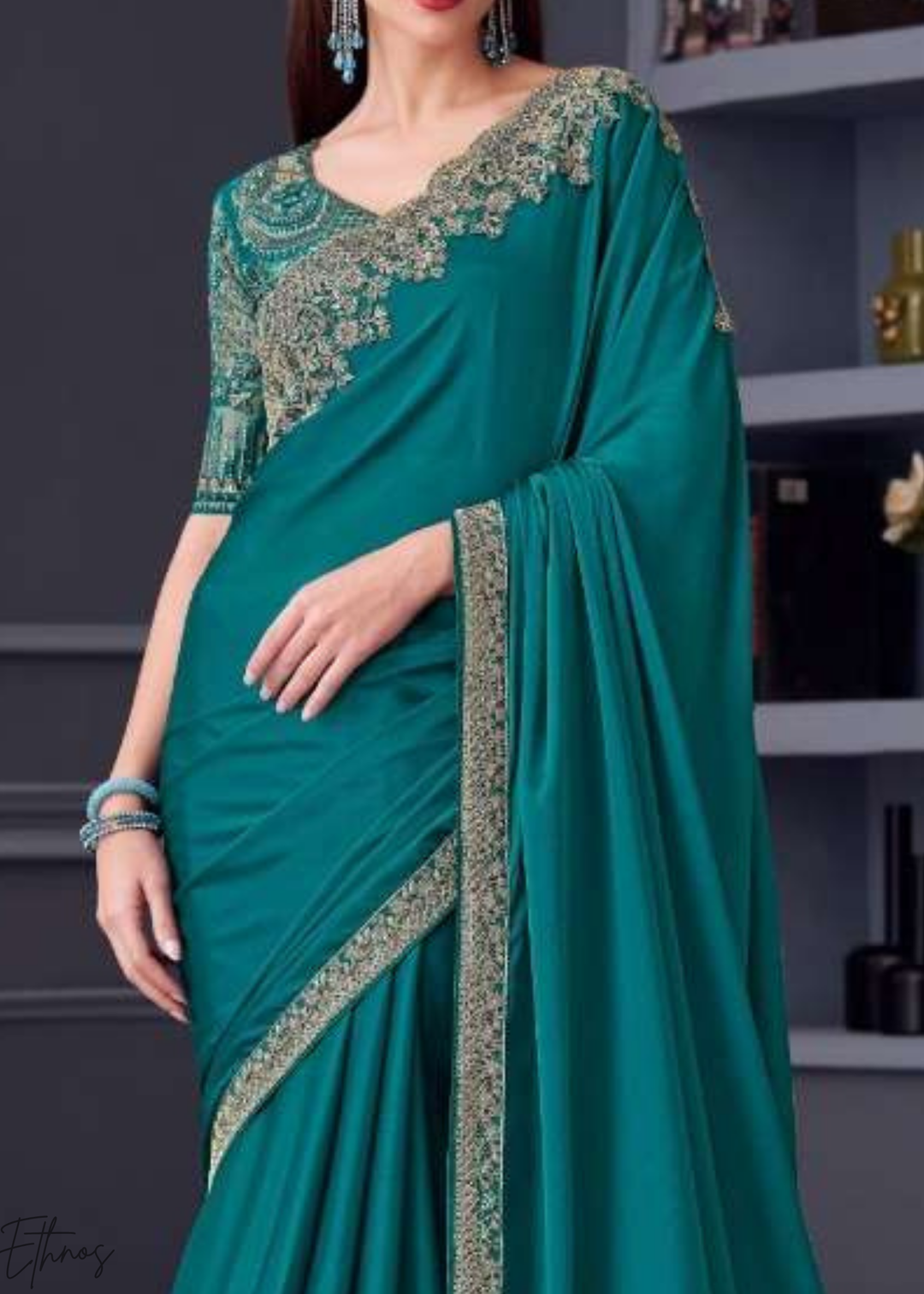 Teal Blue Heavy Border Embroidered Opium Silk Chiffon Saree